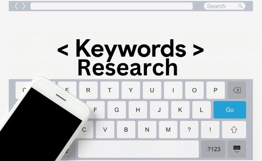 a search at top, keyboard. Above the keyboard words in black typed leters Keyword Research and cell phone on top on the left side. 